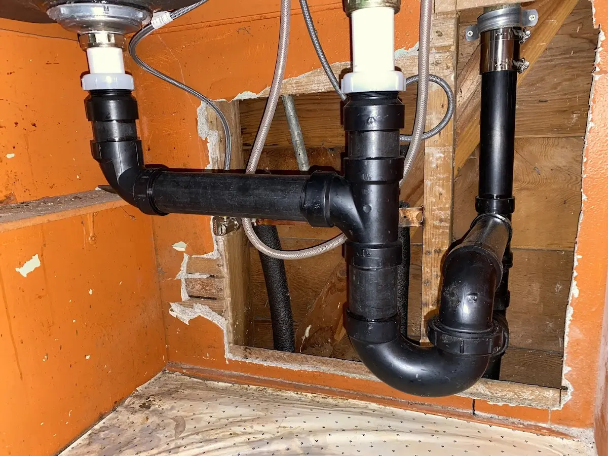 Professional Garbage Disposal Repair equipment and tools on the job in Fort Madison